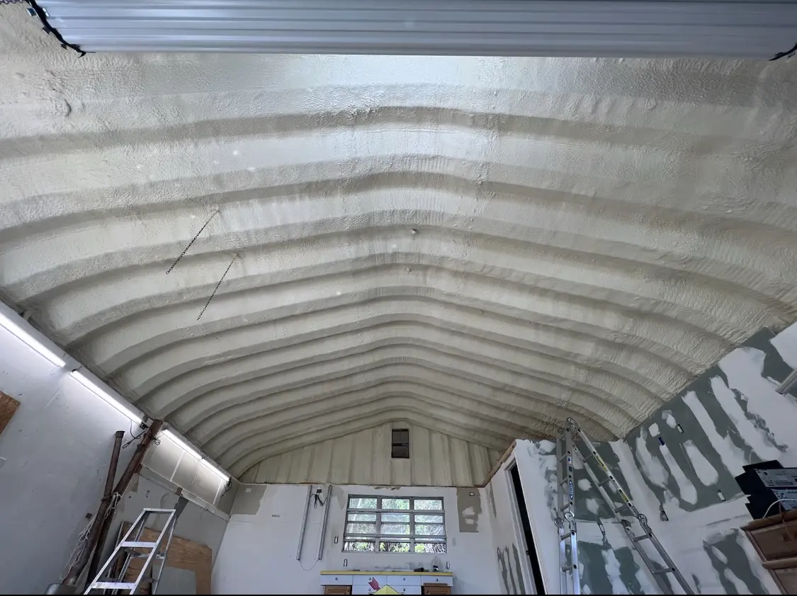 Spray polyurethane foam applied to the underside of a metal roof deck in Killingworth